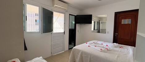 Basic Triple Room | Blackout curtains, iron/ironing board, free WiFi, bed sheets