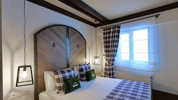 Luxe beddengoed, een minibar, een kluis op de kamer, een bureau
