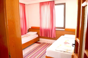 Premium bedding, desk, iron/ironing board, free cots/infant beds