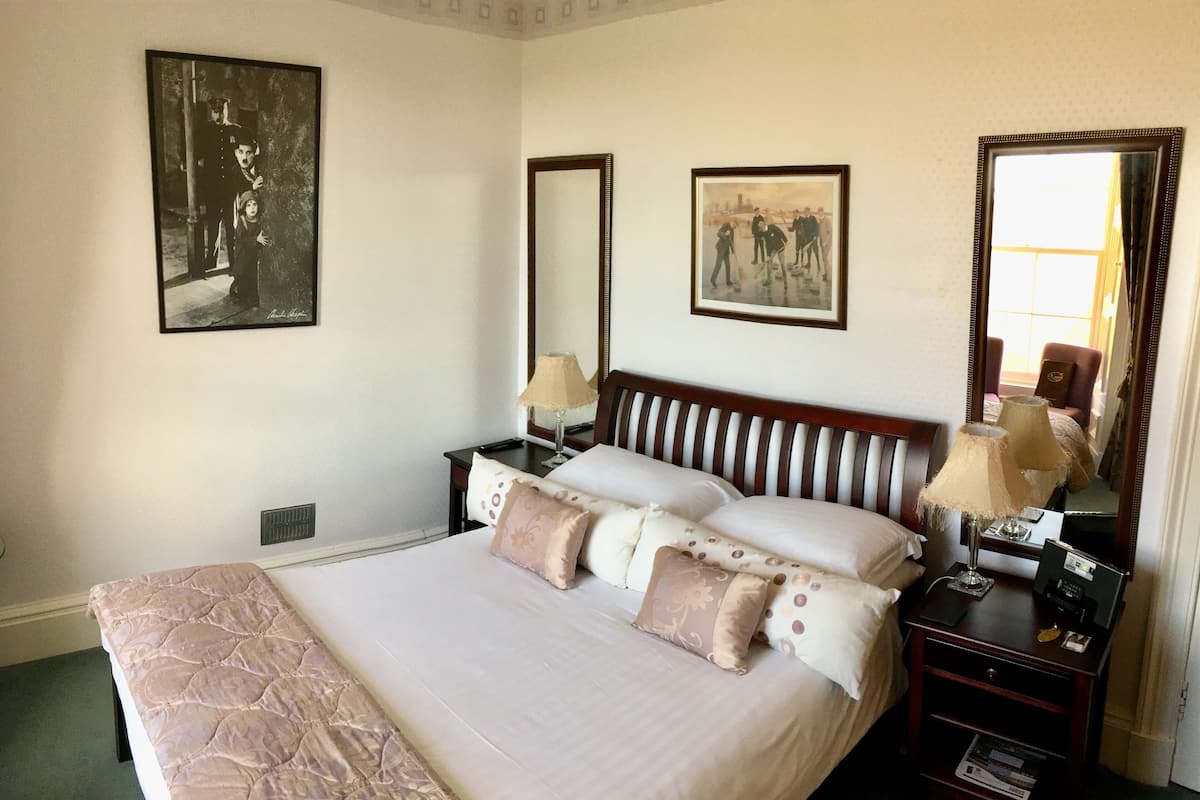 Premium bedding, blackout curtains, iron/ironing board, free WiFi
