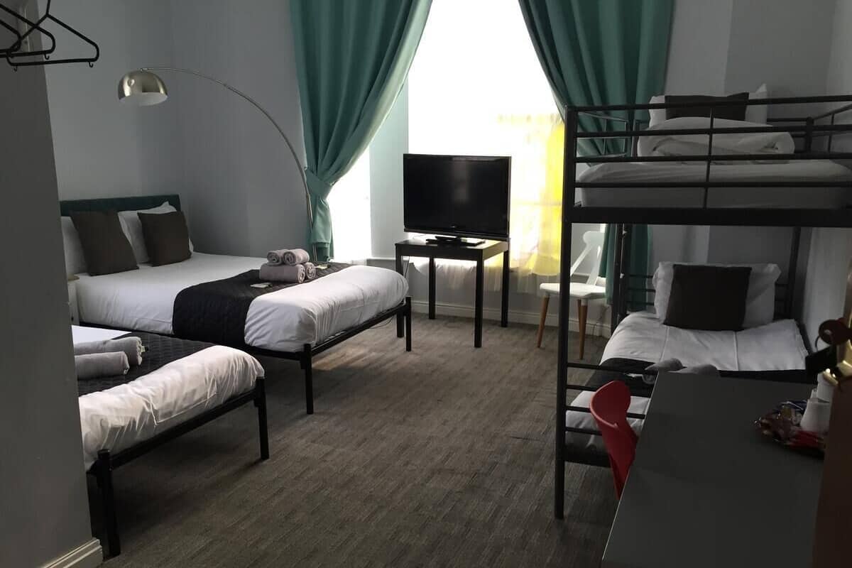 Family Room, Ensuite | Iron/ironing board (on request), WiFi (free), bed sheets