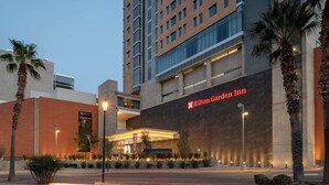 A Hilton Garden Inn with a modern facade, large windows, and a prominent entrance. - Hilton Garden Inn Chihuahua (Chihuahua)