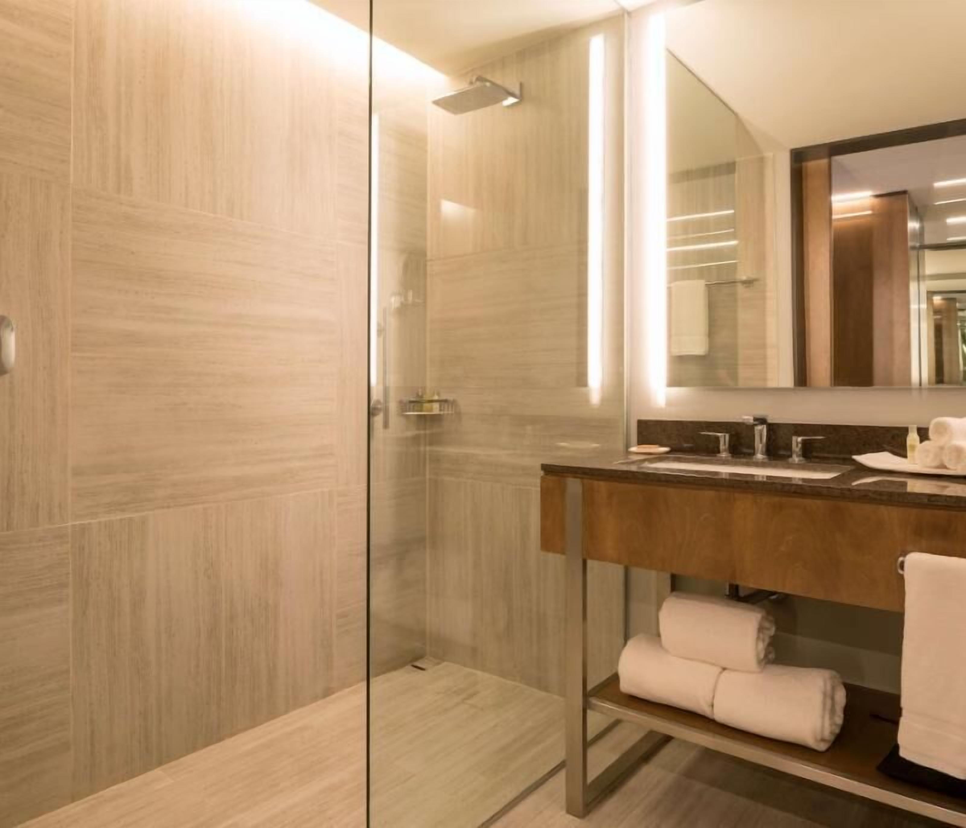 Bathroom | Designer toiletries, hair dryer, towels