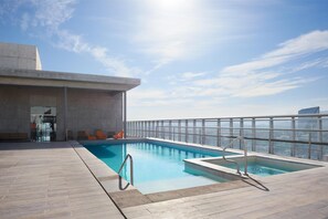 Seasonal outdoor pool, open 9:00 AM to 10 PM, sun loungers