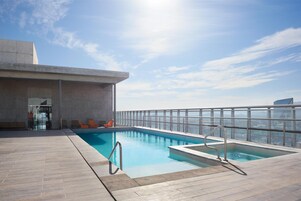 Seasonal outdoor pool, open 9:00 AM to 10 PM, sun loungers