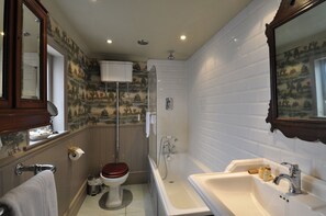 Quarto standard, 1 cama King (John Norris) | Banheiro | Secador de cabelo, roupões de banho