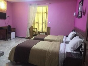 Quarto duplo | Cortinas blackout, ferros/tábuas de passar roupa, Wi-Fi de cortesia