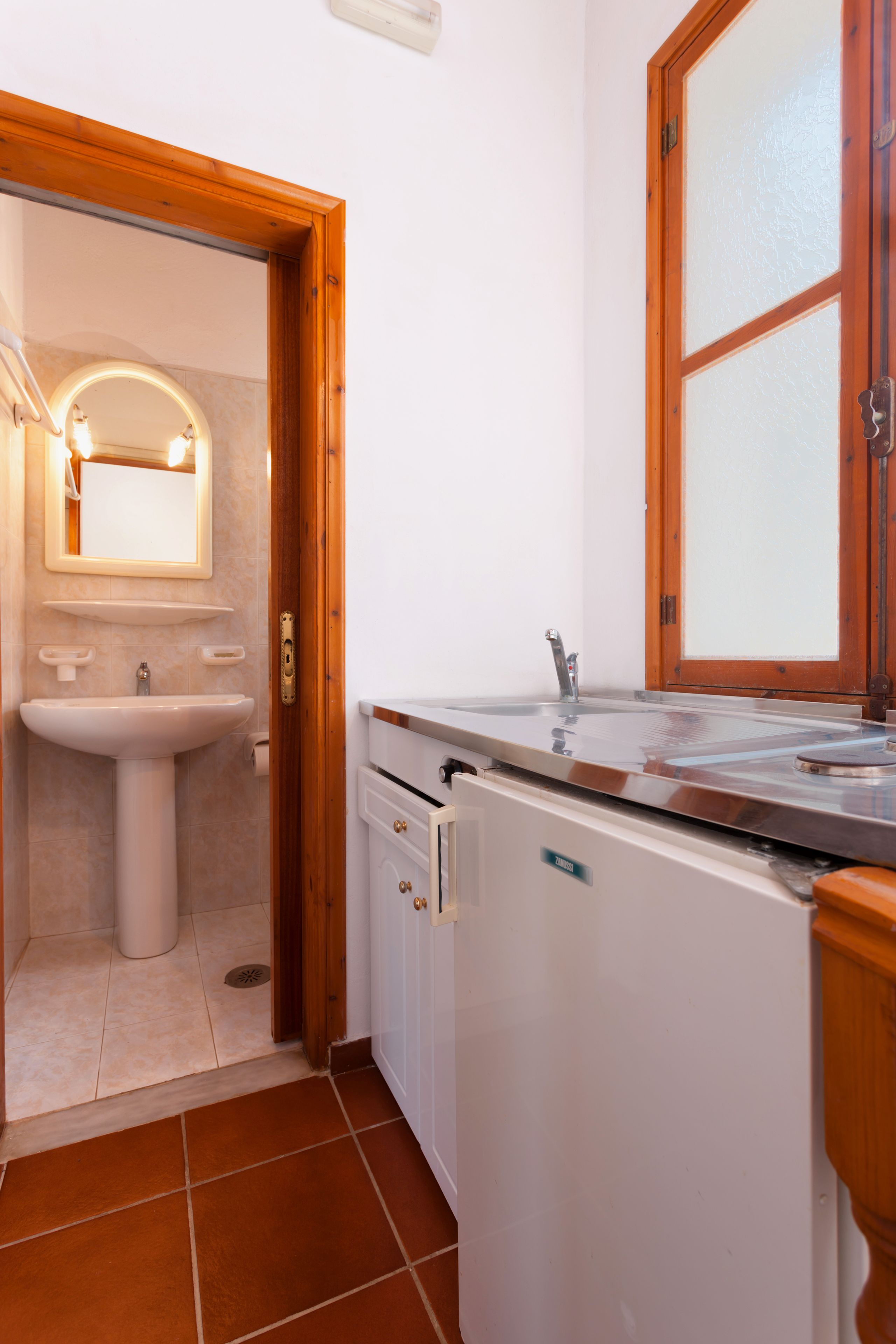 deluxe duplex | private kitchen | fridge, stovetop, electric kettle, toaster oven