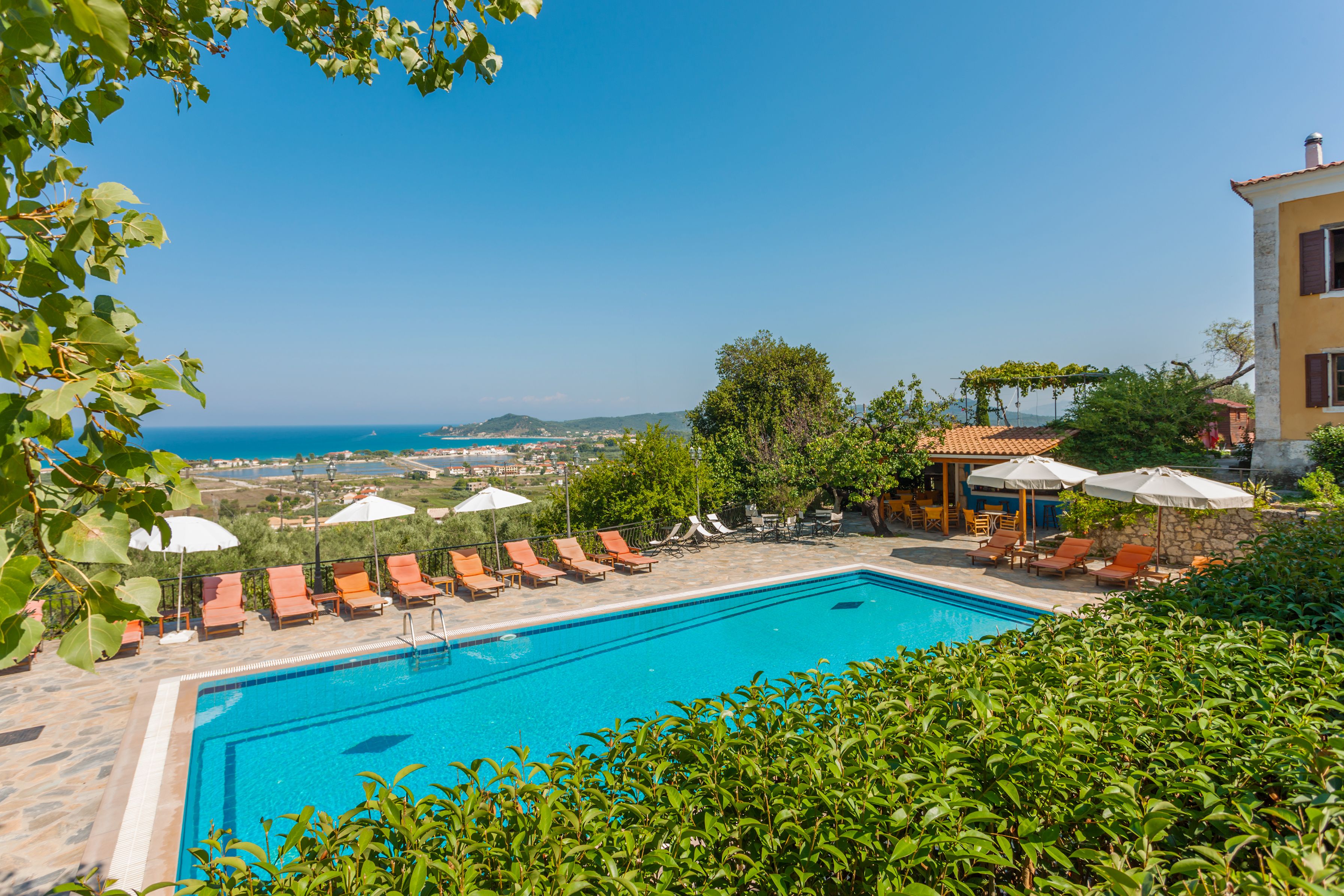 seasonal outdoor pool, pool umbrellas, pool loungers