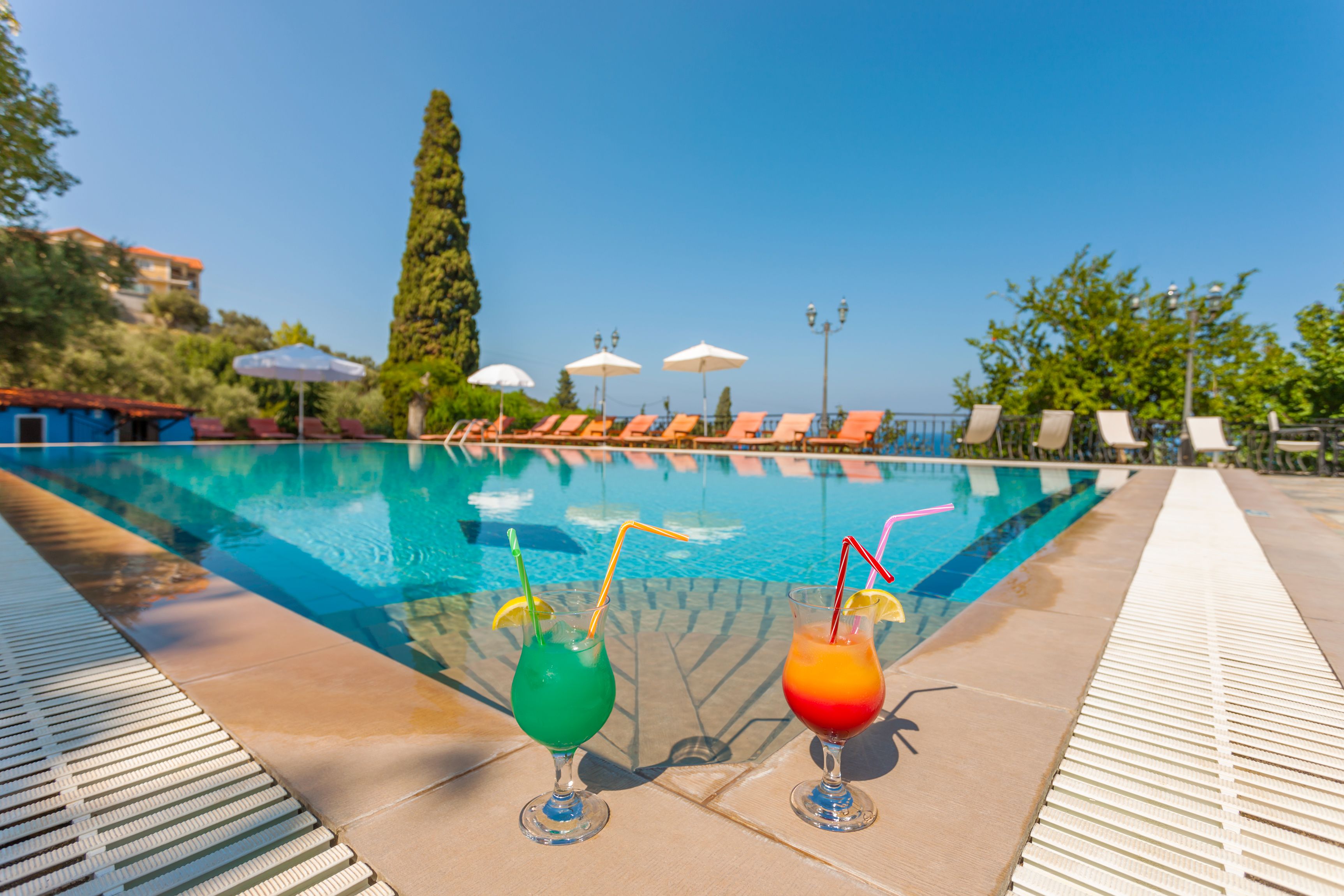 seasonal outdoor pool, pool umbrellas, pool loungers