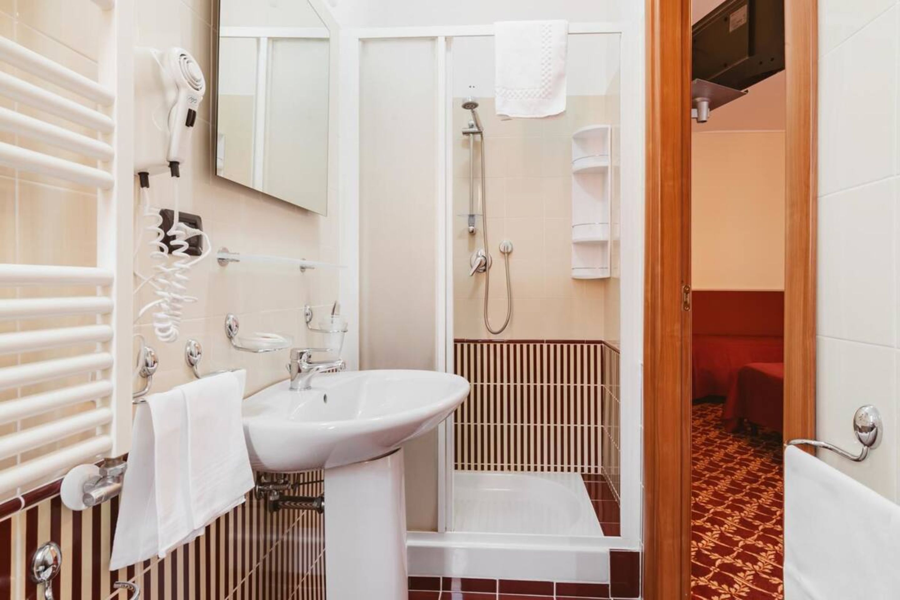 free toiletries, hair dryer, slippers, bidet