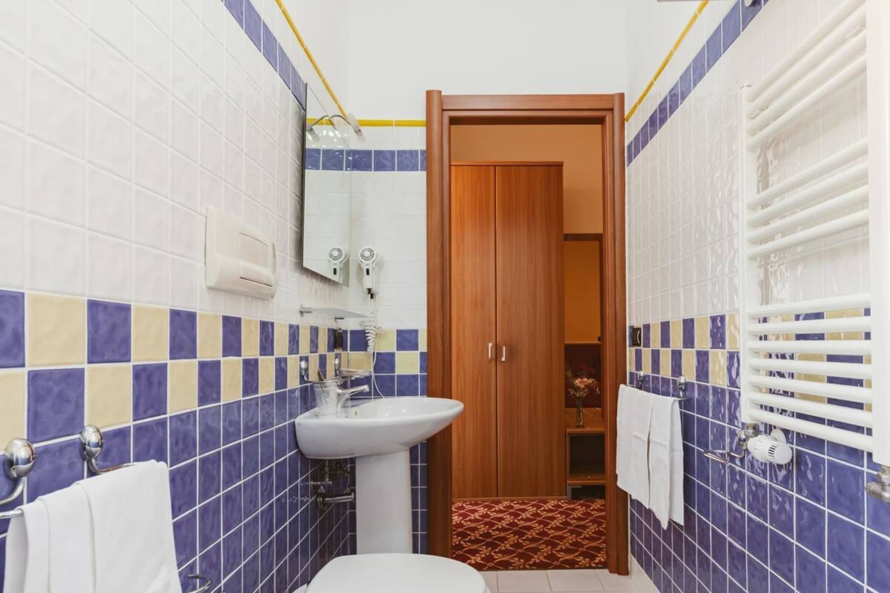 free toiletries, hair dryer, slippers, bidet