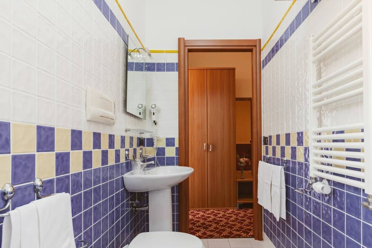 free toiletries, hair dryer, slippers, bidet