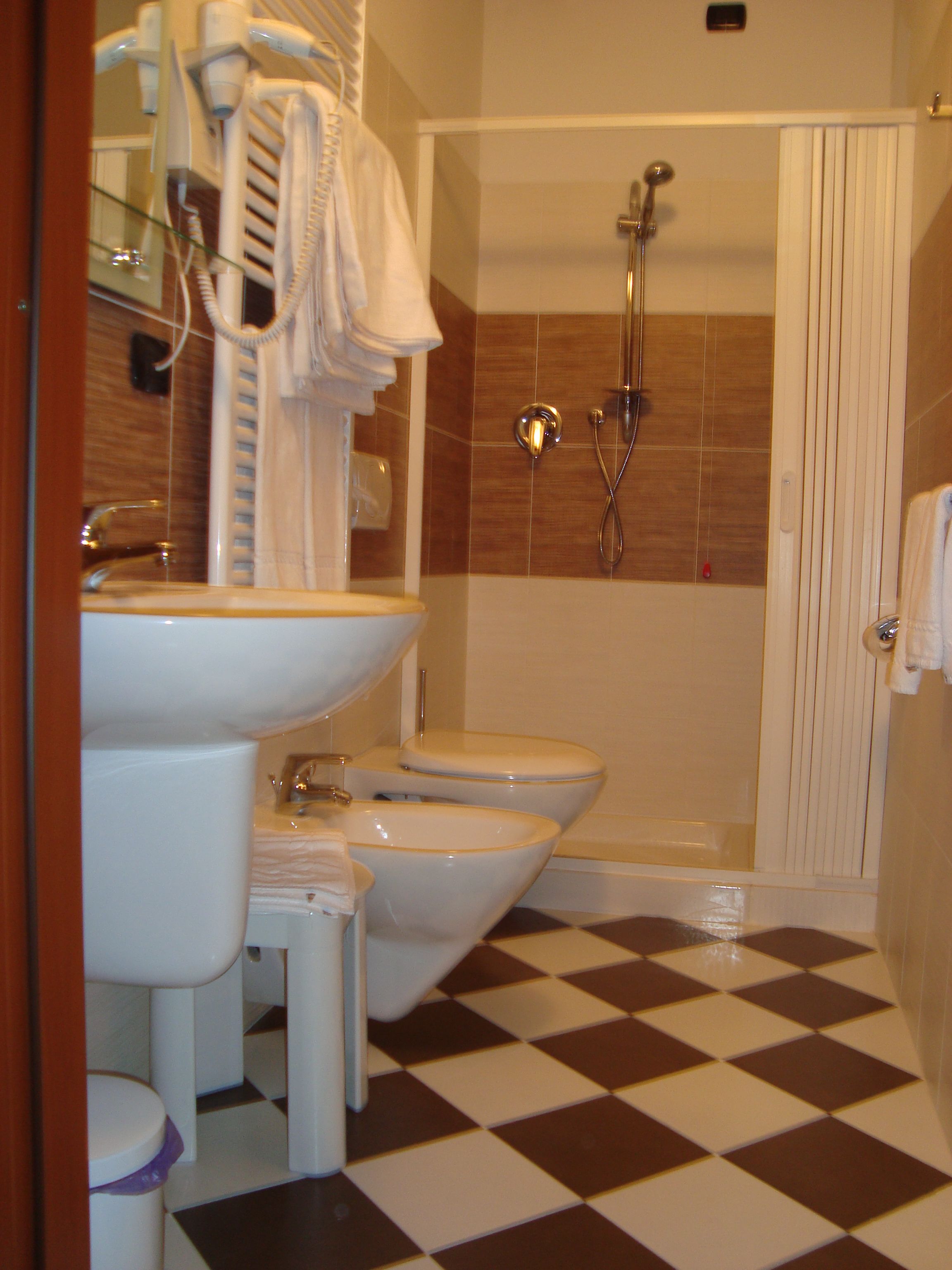 Shower, free toiletries, hair dryer, slippers