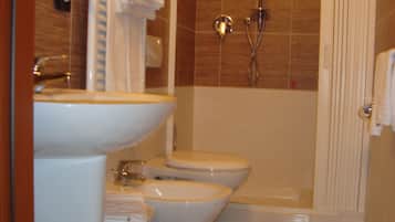 Shower, free toiletries, hair dryer, slippers