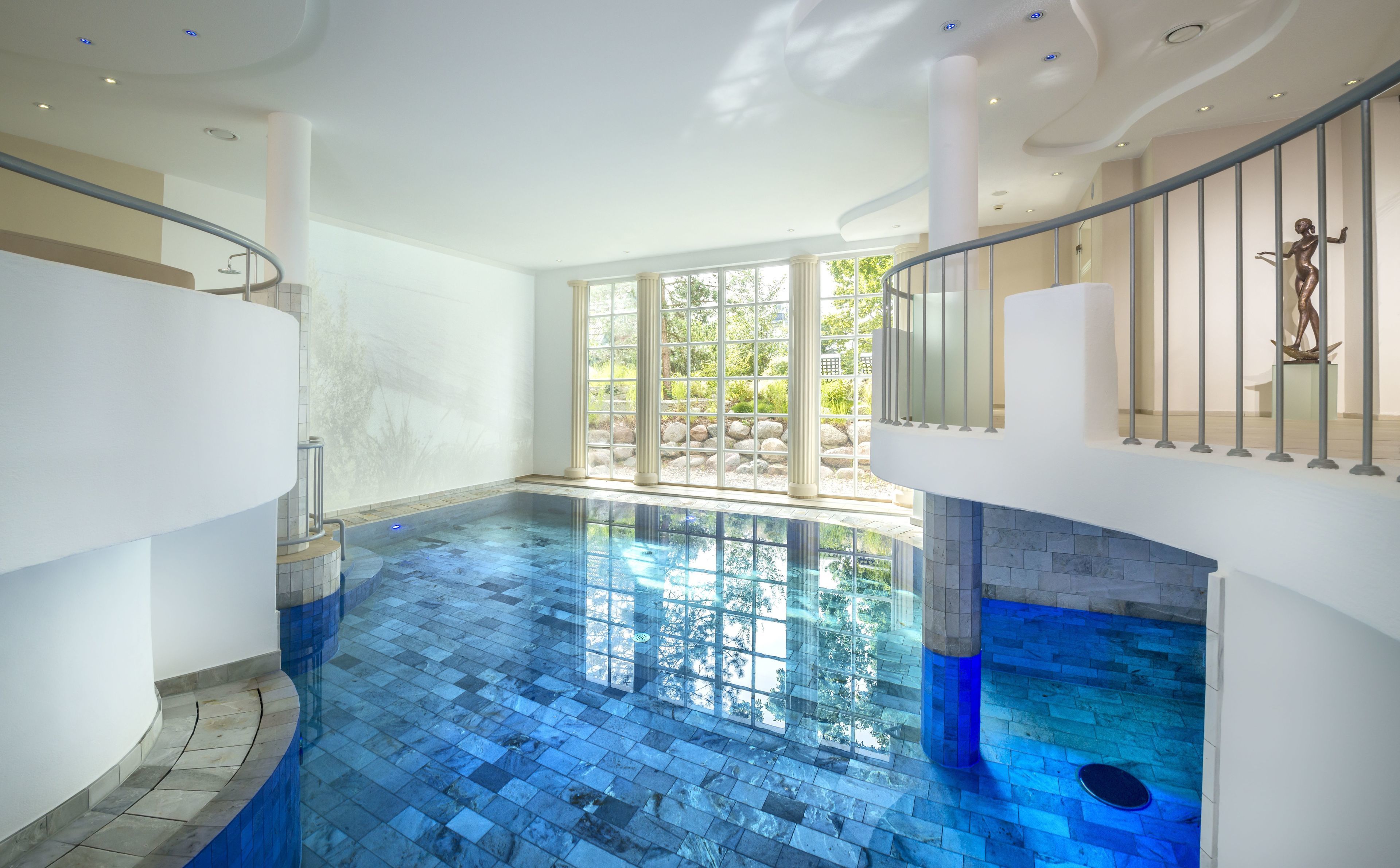 indoor pool, outdoor pool, pool loungers
