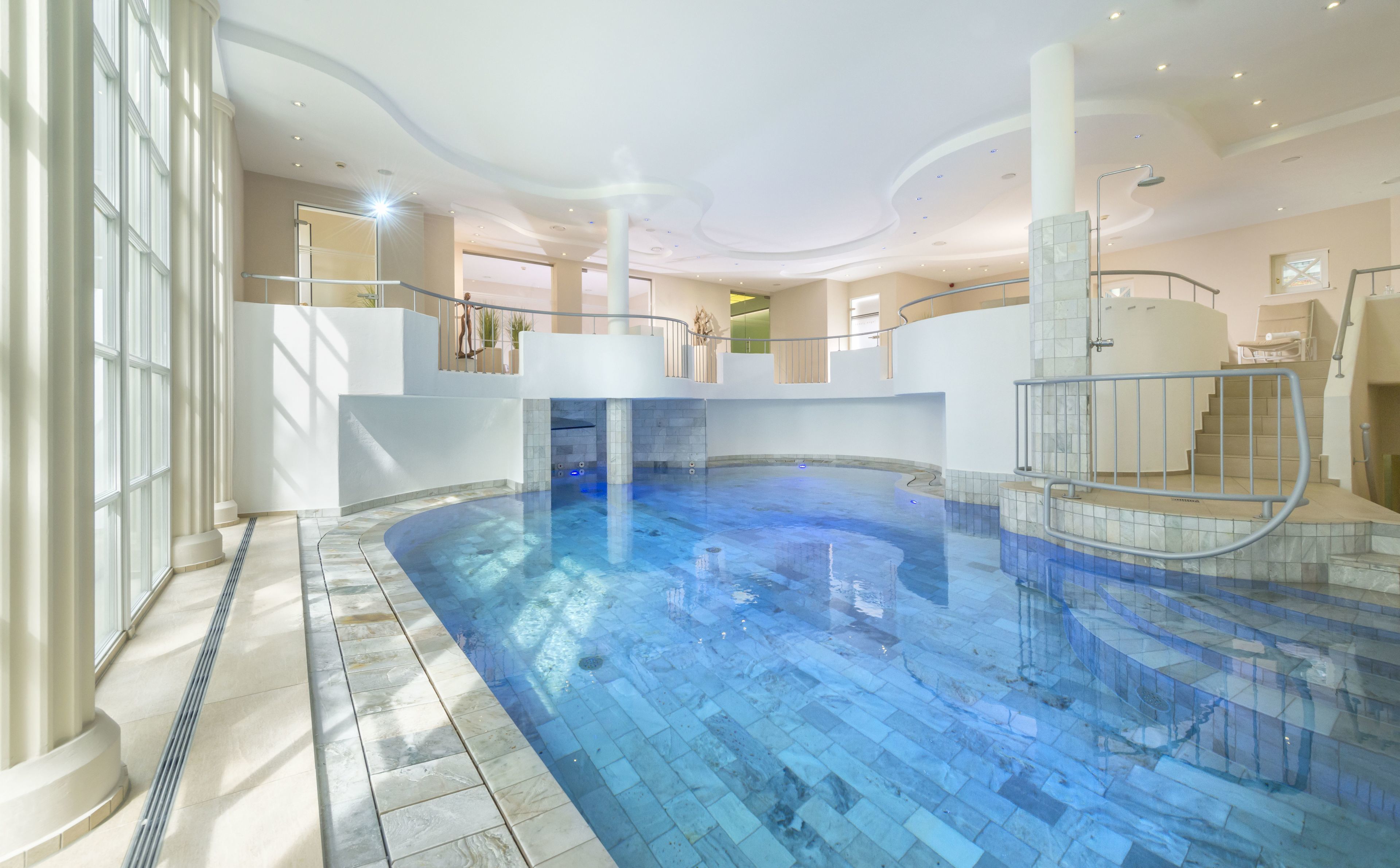 indoor pool, outdoor pool, pool loungers