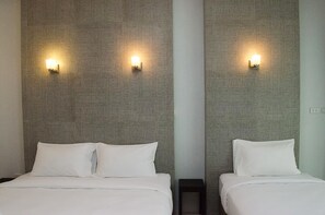 Standard Triple Room | Pengeskab på værelset, ekstra senge (tillægsgebyr), gratis Wi-Fi