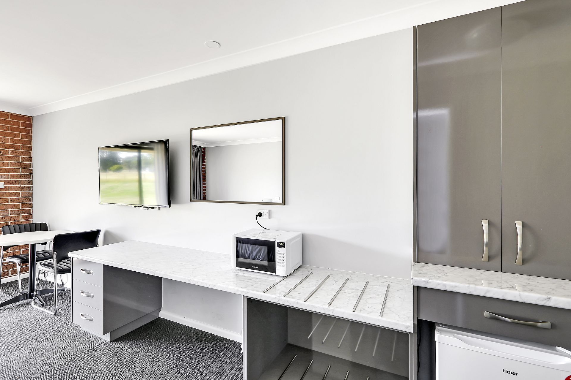 Premium bedding, pillow-top beds, desk, laptop workspace