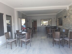 Breakfast, lunch, dinner served; local and international cuisine 