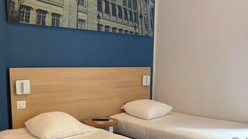 Premium bedding, desk, blackout curtains, soundproofing