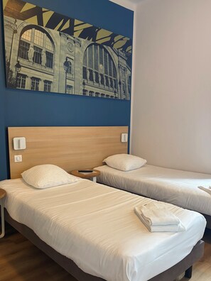 Family Room | Premium bedding, desk, blackout drapes, soundproofing