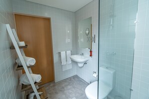 Shower, free toiletries, hair dryer, towels