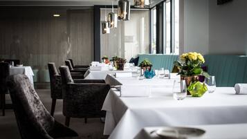 Breakfast, lunch, dinner served; local cuisine