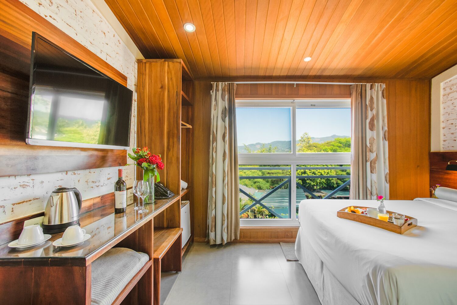 for comfort casal plus | premium bedding, pillow-top beds, minibar, laptop workspace