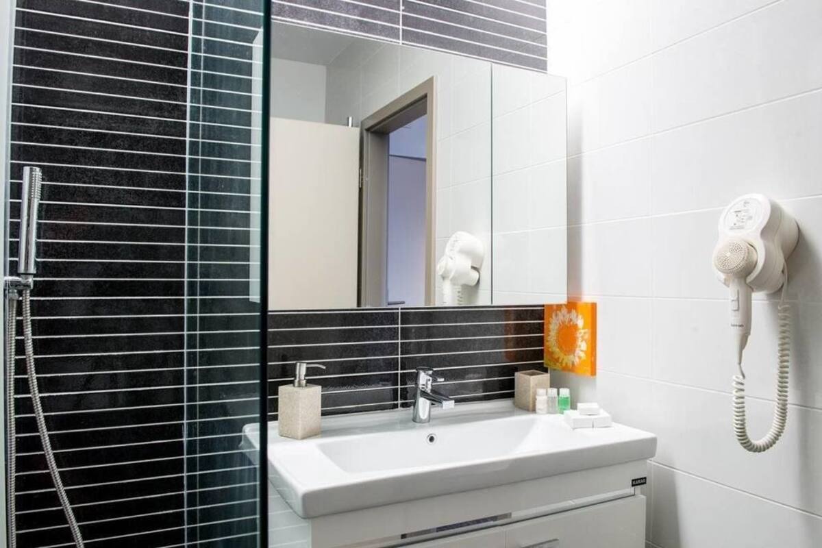 shower, free toiletries, hair dryer, bathrobes