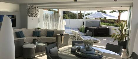 Deluxe Apartment, 2 Bedrooms, Hot Tub, Sea View | Living area | Flat-screen TV, iPod dock, MP3 dock