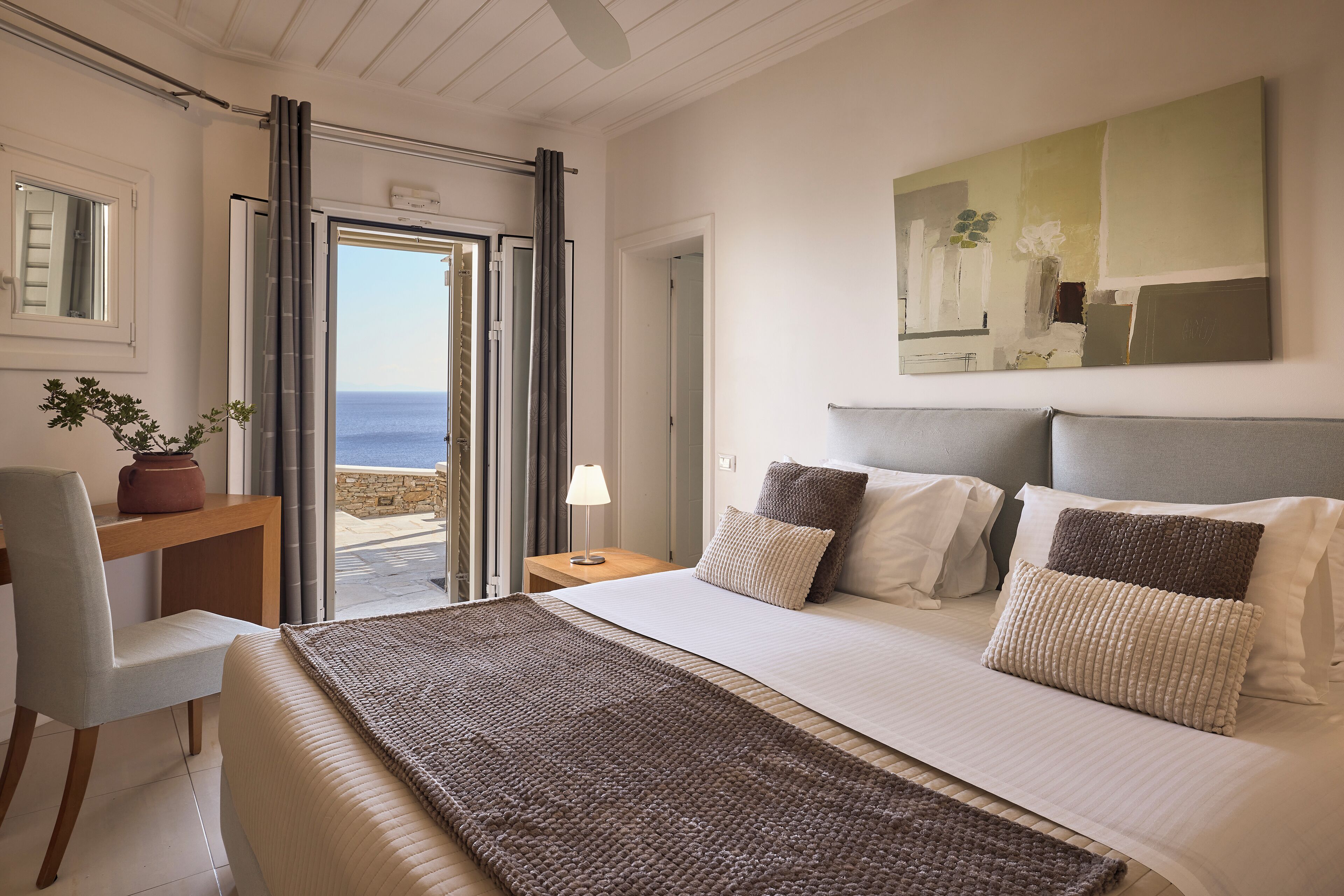 Deluxe Suite | Poolside with Sea view | Pillowtop beds, minibar, in-room safe, soundproofing