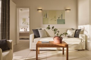 Superior Suite | Upper floor with Sea view | Living area | 42-inch flat-screen TV with cable channels, TV, printers - Selana Suites (Sifnos)