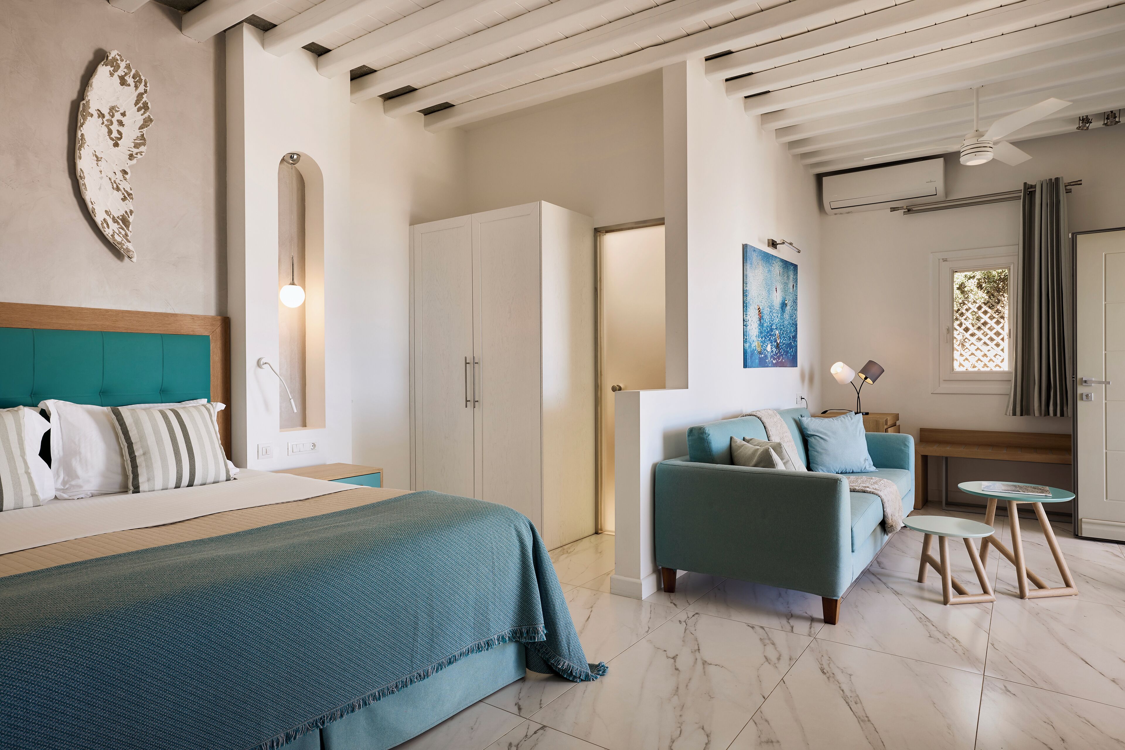 Junior Suite | Upper floor with Sea view | Living area | 42-inch flat-screen TV with cable channels, TV, printers