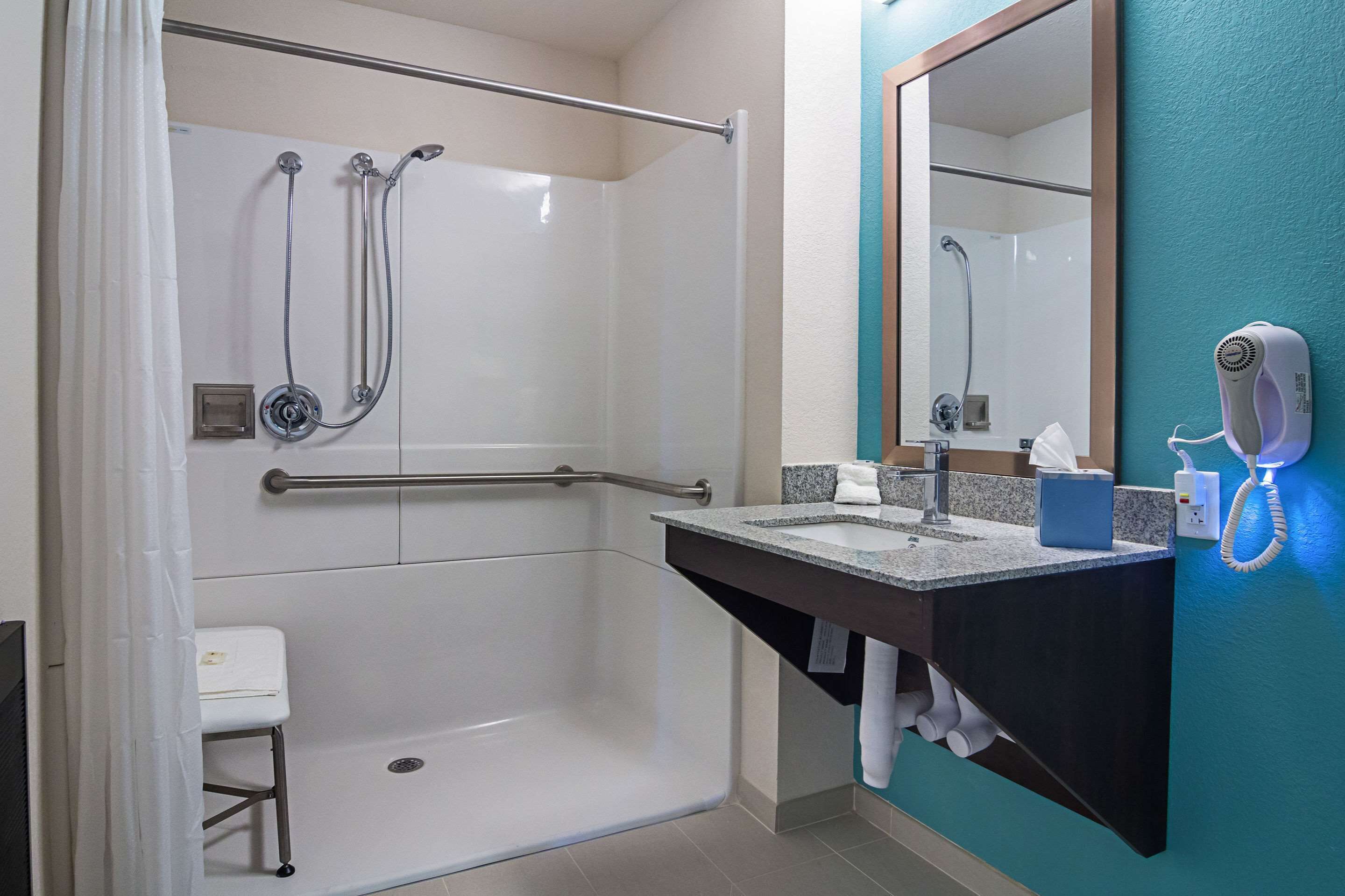 hair dryer, towels, soap, shampoo