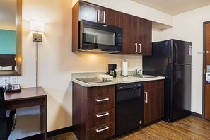Room, 1 Queen Bed, Non Smoking (Efficiency) | Desk, laptop workspace, blackout curtains, iron/ironing board - Suburban Studios Monaca - Pittsburgh (Monaca)