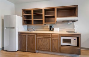 Full-sized fridge, microwave, stovetop, freezer