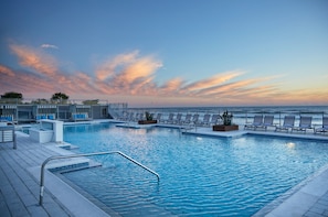 2 outdoor pools, a heated pool, pool umbrellas, pool loungers