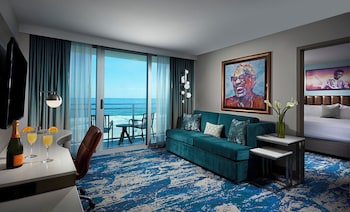 Ocean Front King Balcony - Sofa Bed | 1 bedroom, premium bedding, in-room safe, individually decorated at Hard Rock Hotel Daytona Beach