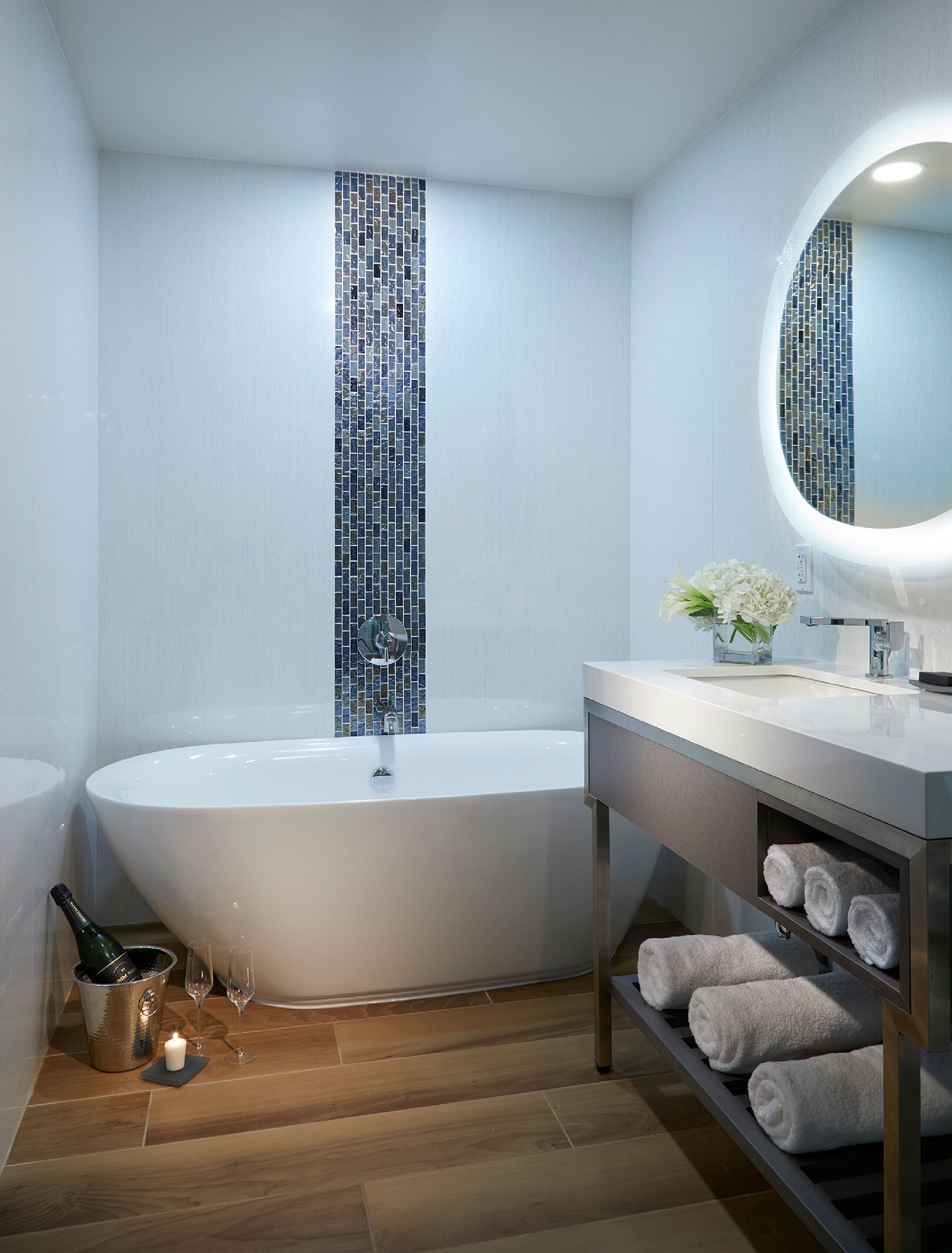 rainfall showerhead, designer toiletries, hair dryer, towels