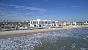 A beachfront hotel with multiple floors, a pool, and a view of the ocean. - Hard Rock Hotel Daytona Beach (Daytona Beach)