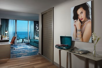 Suite, 1 Bedroom, Oceanfront | 1 bedroom, premium bedding, in-room safe, individually decorated at Hard Rock Hotel Daytona Beach