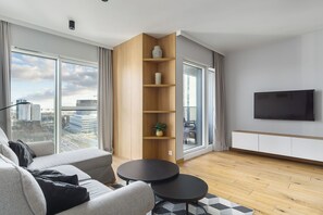 Apartemen Deluks, 1 kamar tidur | Area keluarga | TV layar datar