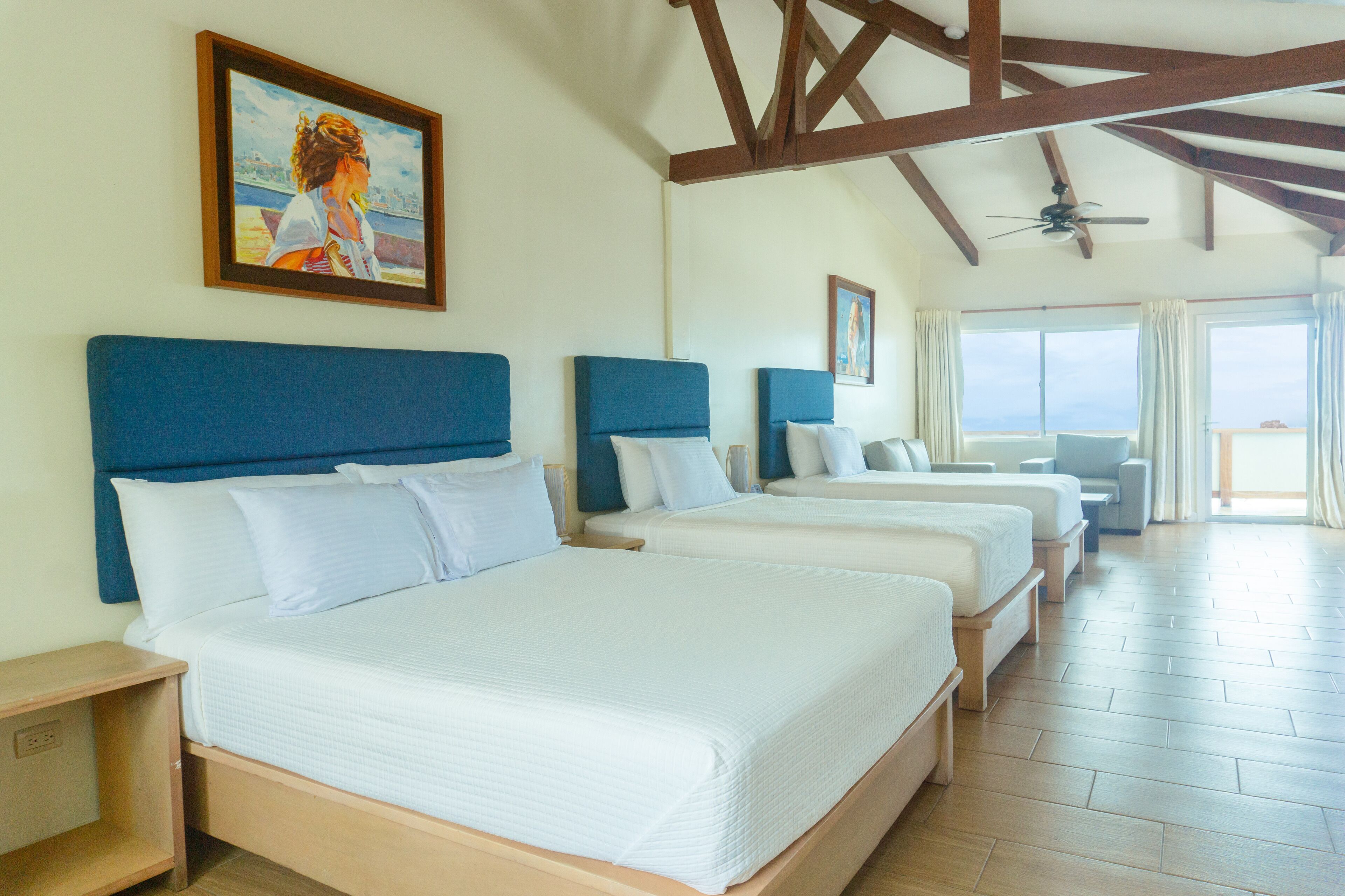 triple room, sea view | 1 bedroom, in-room safe, desk, iron/ironing board