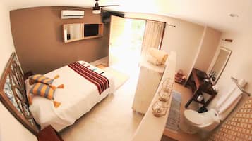 Basic Studio, 1 Queen Bed, Courtyard Area | In-room safe, individually decorated, individually furnished, bed sheets