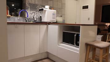 Fridge, microwave, stovetop, coffee/tea maker