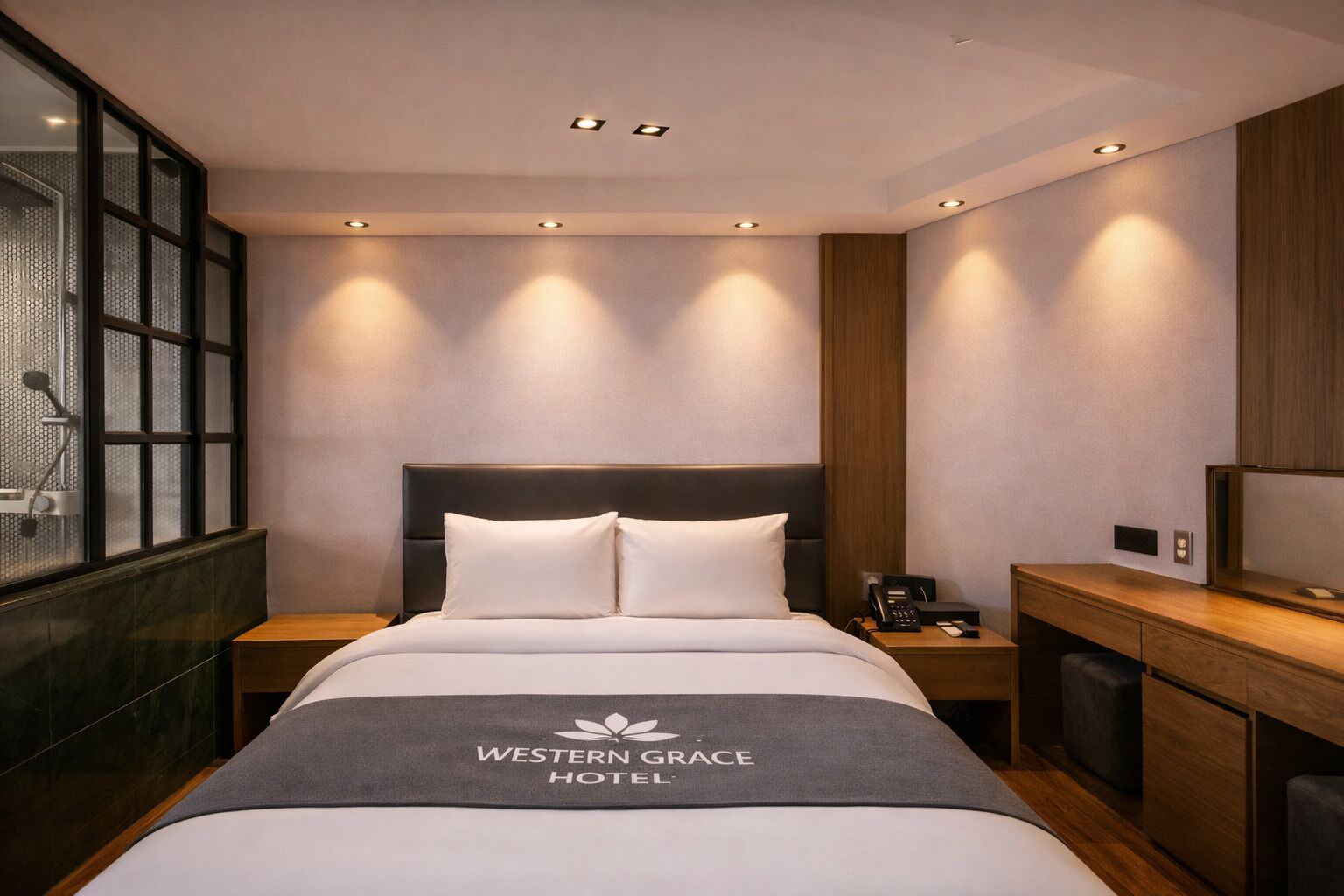 Ein Hotelzimmer mit Bett, Nachttischen, einem Schreibtisch und einer Dusche.