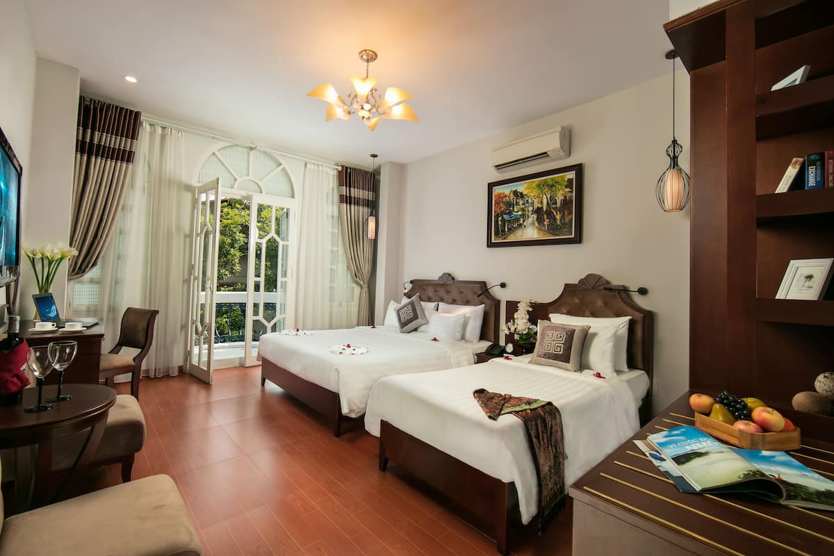 Habitación triple Deluxe, balcón, vista a la ciudad | Vista desde la habitación