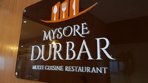 A sign for Mysore Durbar, a multi cuisine restaurant. - Samudra Mysore (Mysore)