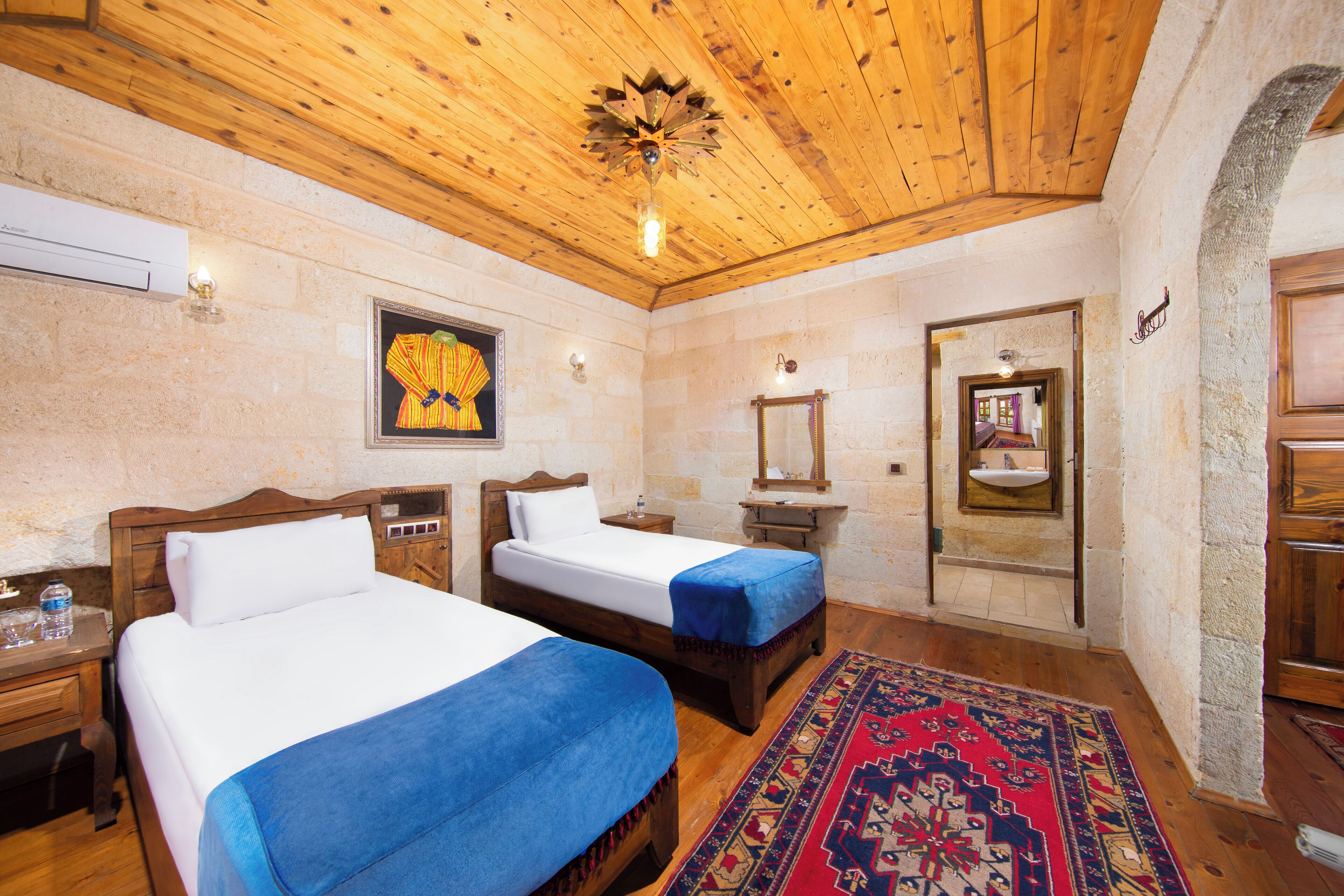 zelve deluxe konak room | premium bedding, down duvets, minibar, in-room safe